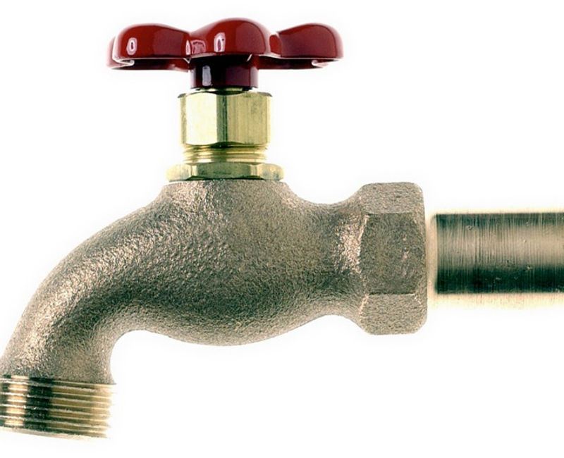 Gator Plumbing team / shop photo from their About page